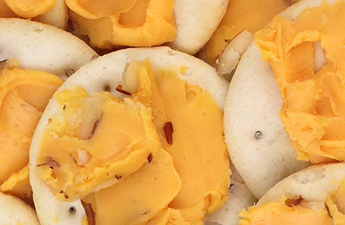 hummus spread on crackers