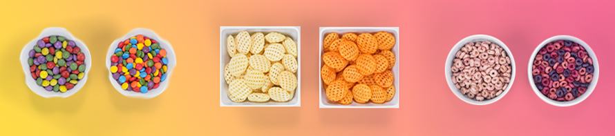 assorted bowls of colorful foods and snacks