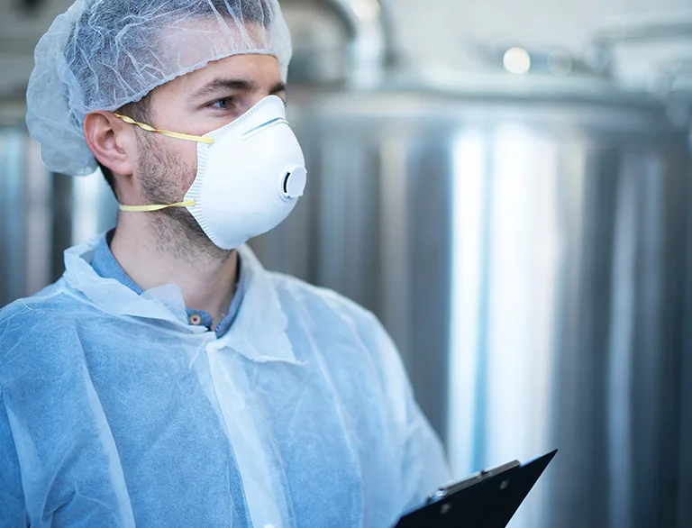 worker checking safety protocol