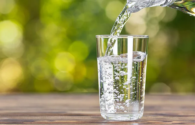 water being poured into glass