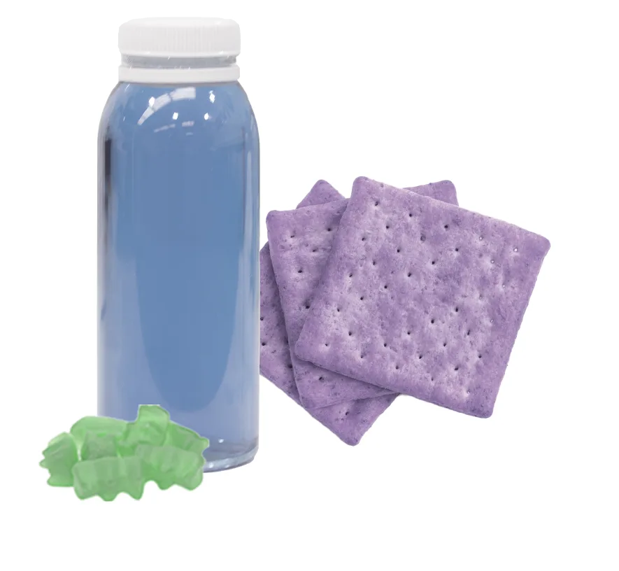 blue drink, green gummy candy, and purple crackers